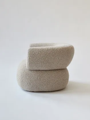 Moving Mountains Puffer chair by boucle fabric