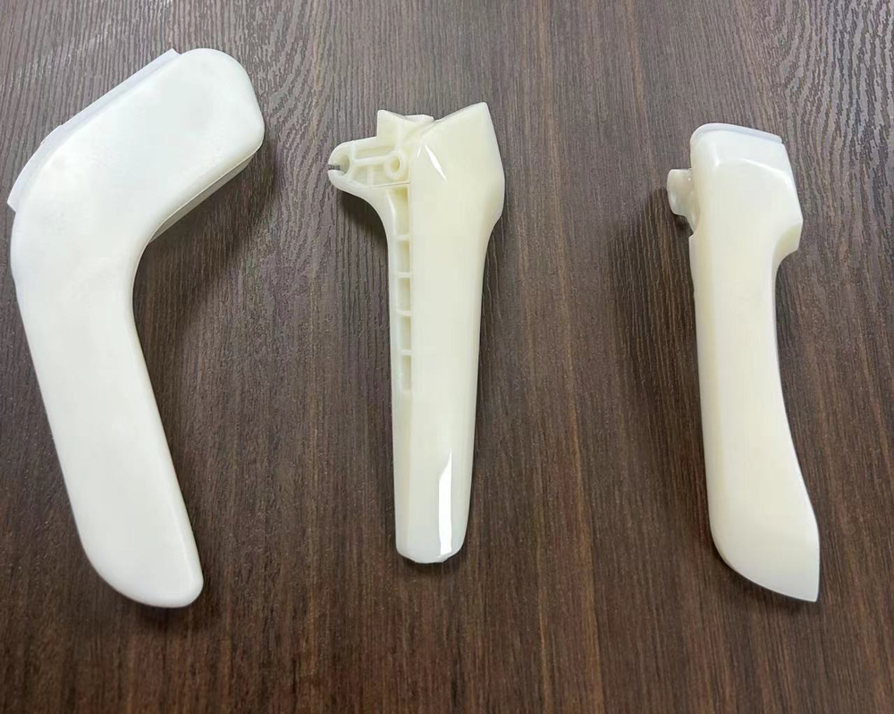 Đúc phun cho tay nắm cửa ô tô