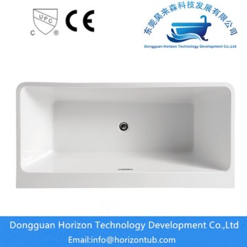 White glossy acrylic bathtub