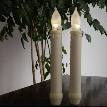 Ivory flameless dripped flickering LED taper candle