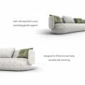 Contemporary three-seater fabric sofa