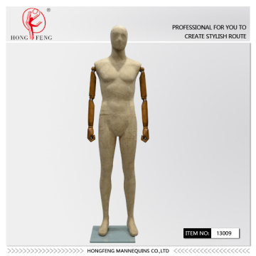 high-tech paper-stick mannequin with wooden hand
