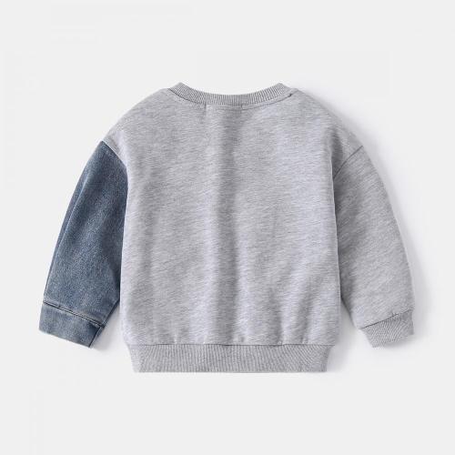 Suéter superior de algodón de los niños de primavera.