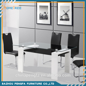 Dining table with wooden leg and two tempered glass