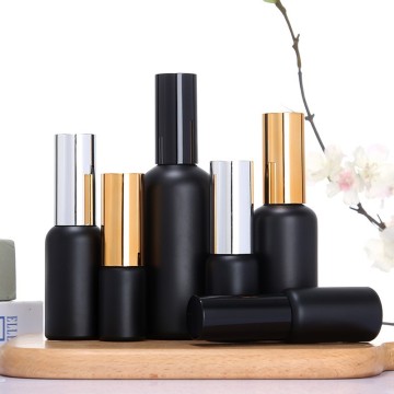 Botellas de spray de vidrio negro y glaseado con esmalte vacío con pulverizador y bomba de loción (20 ml/30ml/50ml/100ml)