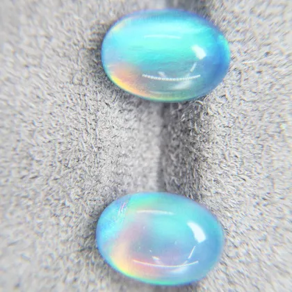 Synthetic Aurora Opal White Crystal Egg Shaped Plain