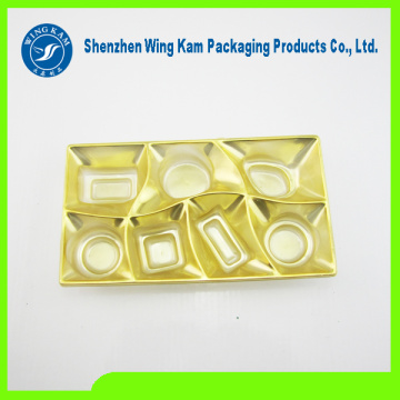 customized PS Food grade plastic gold tray packed for delious chocolate