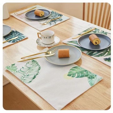 Aanpasbare hete verkoop groene plant bladeren afdrukken katoenen linnen placemats met niet-slipachter