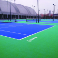 Scuola di pavimenti in campo da tennis blu e verde che utilizzano