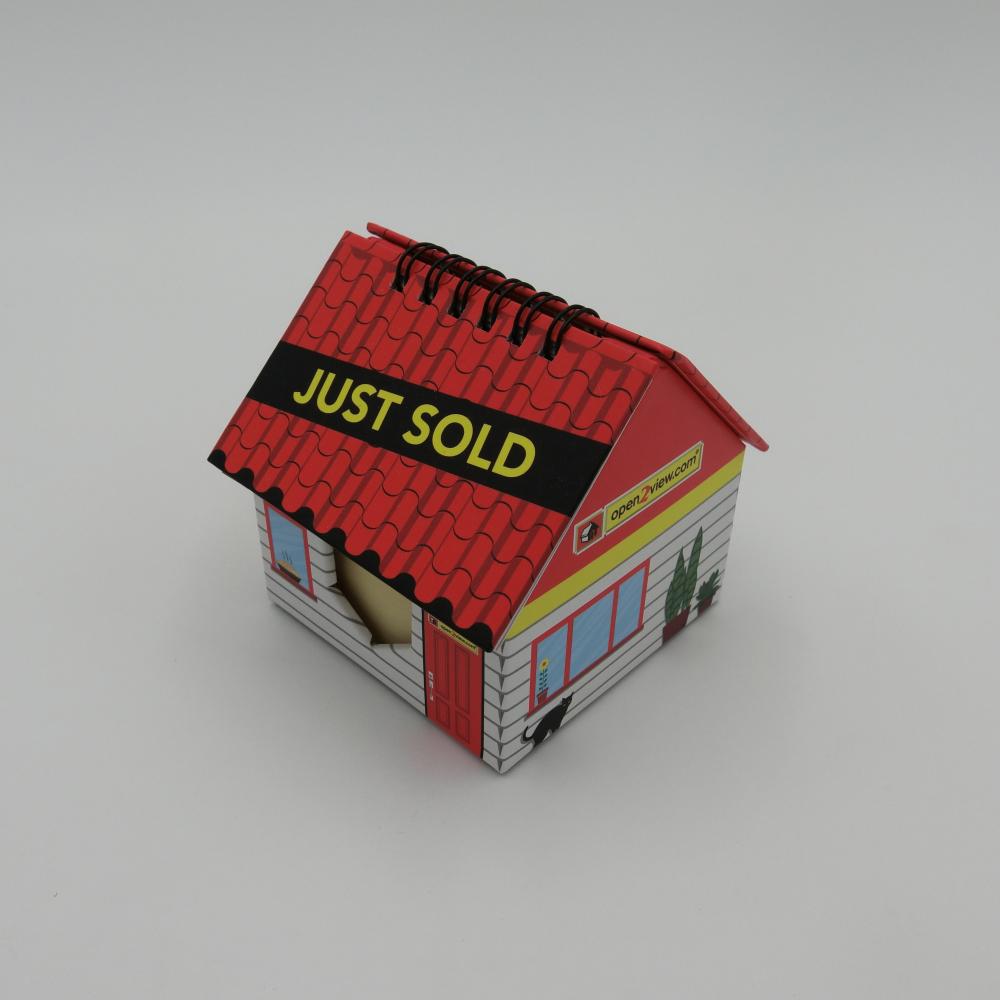 house-shaped sticky note with clendar