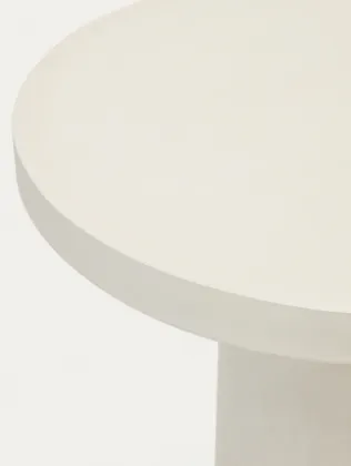 Round table in white cement