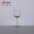 Hand blown dark green colored wine glass set