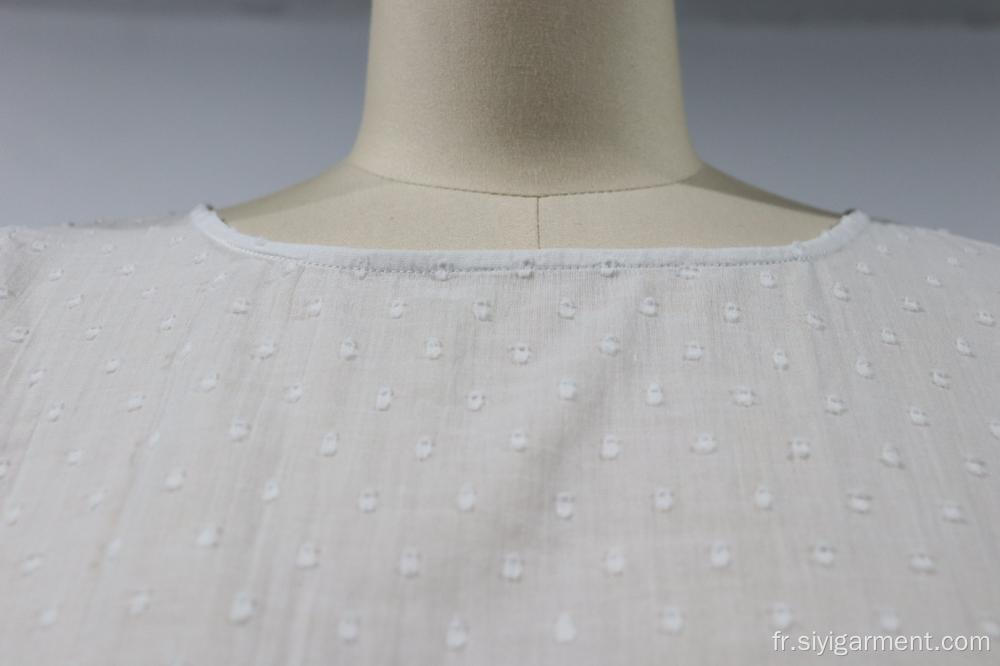 Blouse blanche à manches longues avec taille rentrée