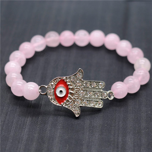 Bracelet de pierres précieuses tendues avec perles rondes de quartz rose 8MM avec pièce pour le mauvais œil Diamante