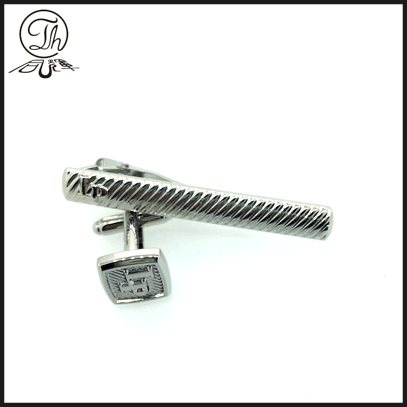 Cufflink and tie clip set