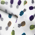 Cotton poplin with pineapple print on white background