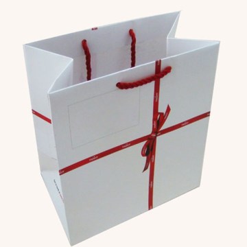 White paper shopping bag with ribbon handle