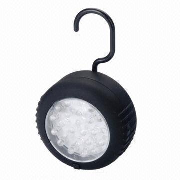 LED flashlight with magnet base