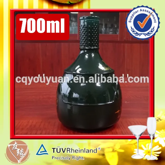 Odd shaped 700ml cork top dark green glass liquor bottle