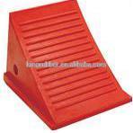Strong PU foam or rubber wheel chock with Recessed carrying handle for Truck, Weather-resistant, Resistant to fuels, and solvent