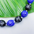 DIY Kukui Nut Beads Graduation Leis