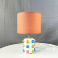Resin base fabric shade decorative table lamp