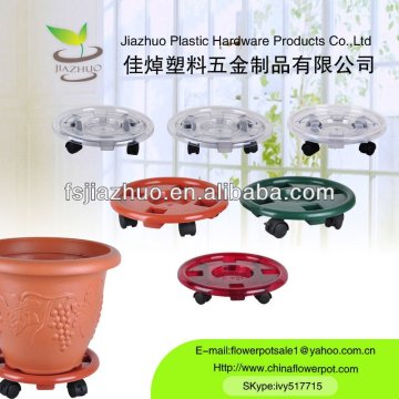 Moving plastic flower pot caddy with wheels