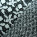 Tessuto jacquard interblocco, fatto di lana e poliestere, pesa 135gsm