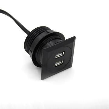 Bouchon embarqué rond noir avec doubles ports USB