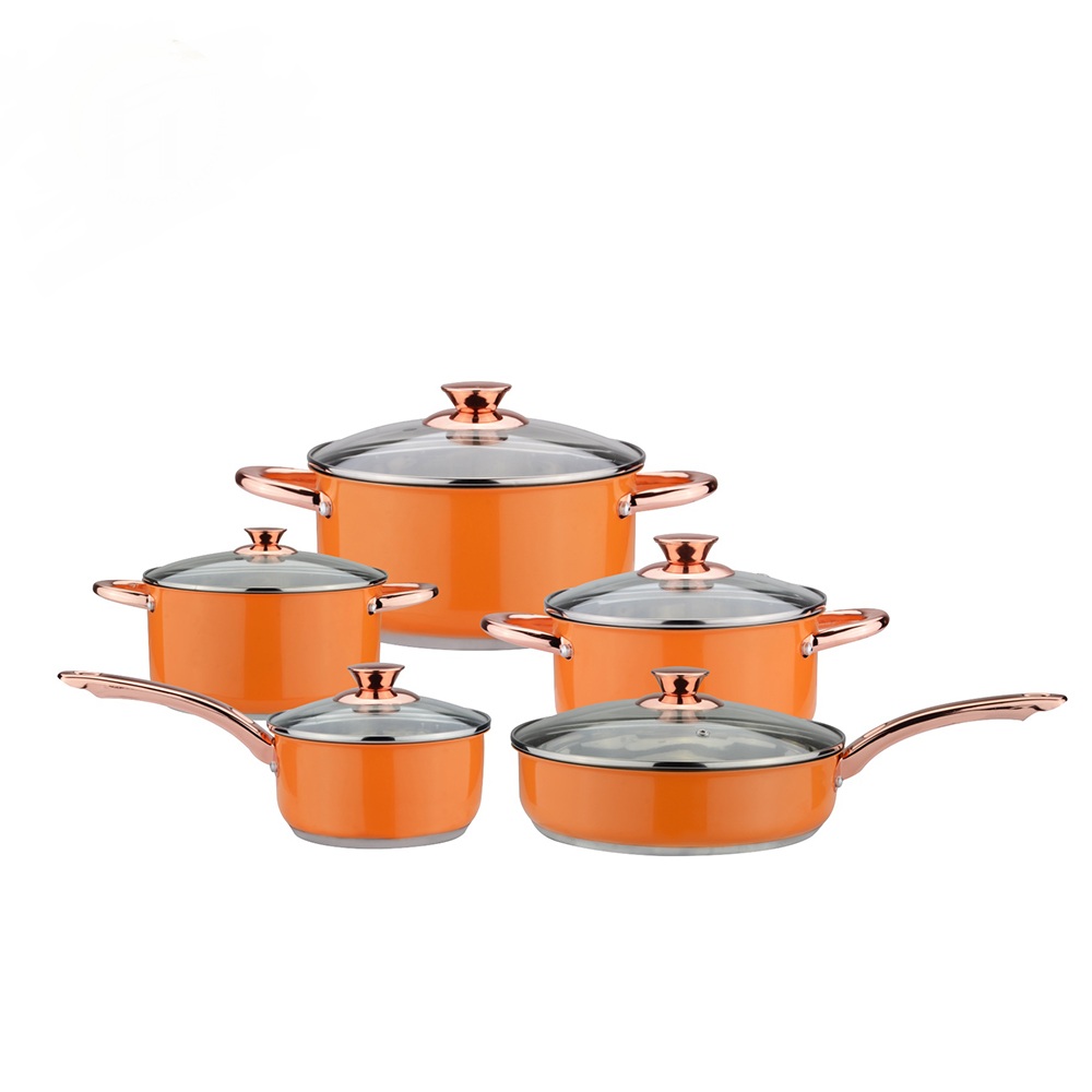 Cookware de cor laranja com alça de ouro rosa