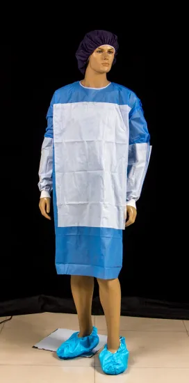 Disposable sugical gown material with reinforced piece