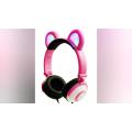 Auriculares con luz LED divertidos promocionales con oreja de oso