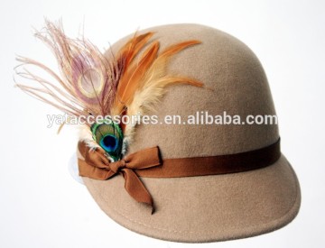 100% wool felt women cap hats in tan color with matching grossgrain bow trimband and feather trim