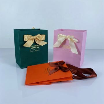 Bolsa de papel de regalo personalizada con arco