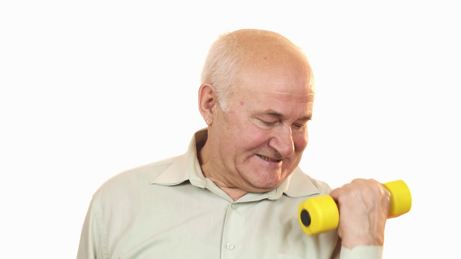 videoblocks-cheerful-old-man-smiling-showing-thumbs-up-working-out-with-a-dumbbell-isolated-sport-motivation-health-seniority-lifestyle-active-people-happiness-strength-biceps-muscles-bodybuilding-gym_b-eodnm