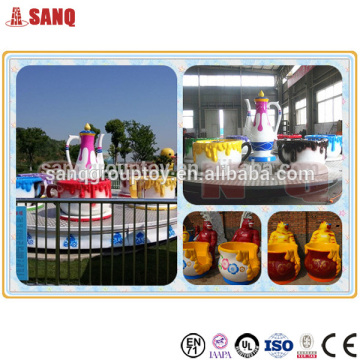 Amusement park rotating cup and saucer rides