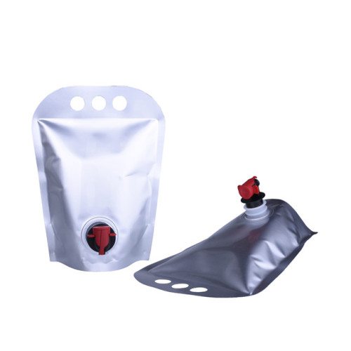 Plastic stand up wine bag with handle and tap