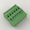 Vertical pin connector beside sealed terminal block