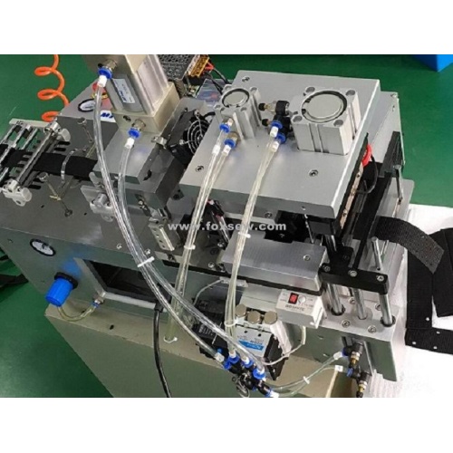 Coupe-ruban automatique à couteau chaud avec perforateur