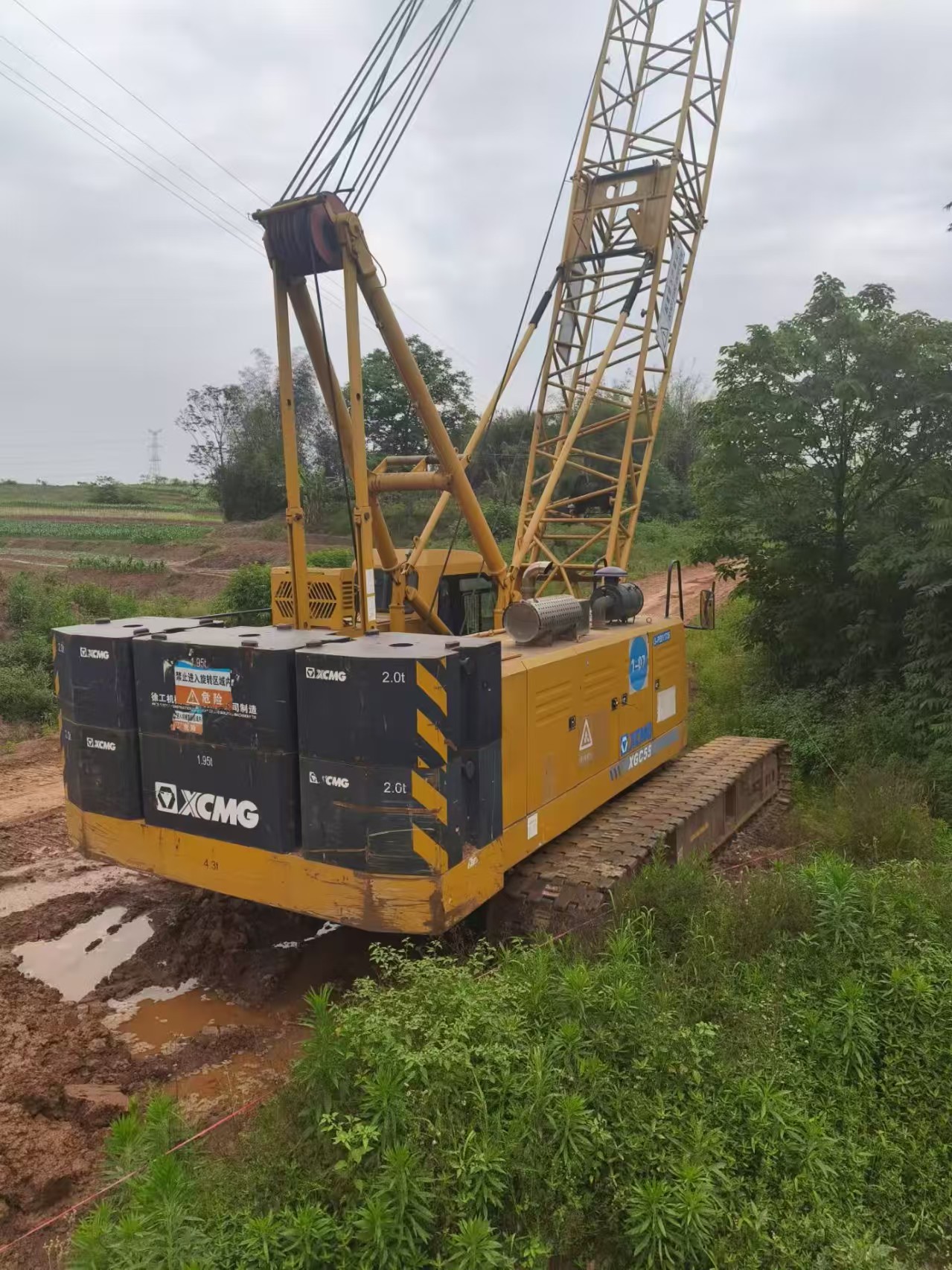 used crawler crane with extended boom-xgc55