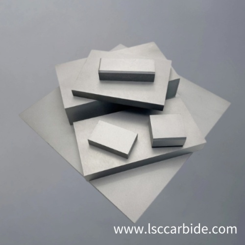 High impact resistant tungsten carbide plate