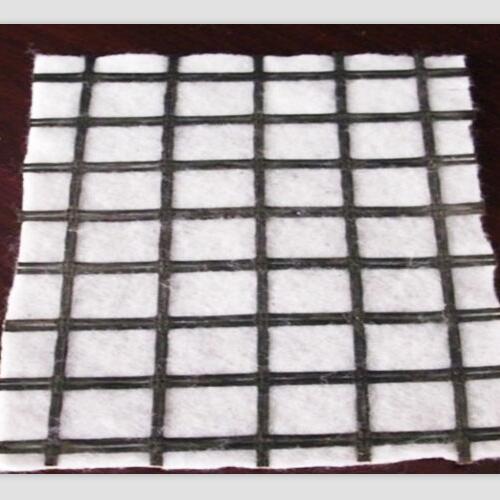 China Polyester Or Fiberglass Geogrid Composite With Geotextile Supplier