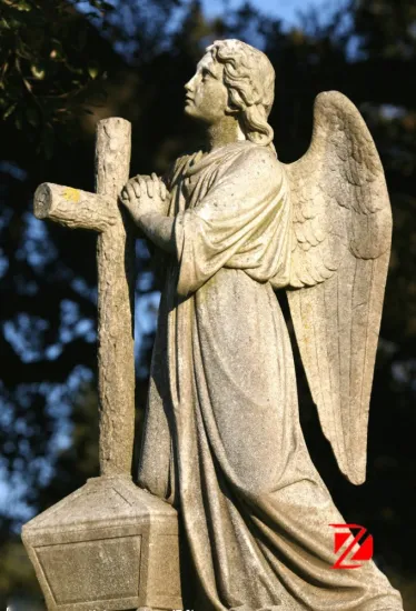 Weeping angel tombstone praying looking up
