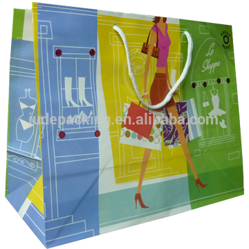Fashion shopping bags,with handle,tags.Glossy .250g art paper