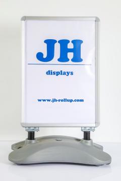 Street sidewalk display pavement sign with water tank