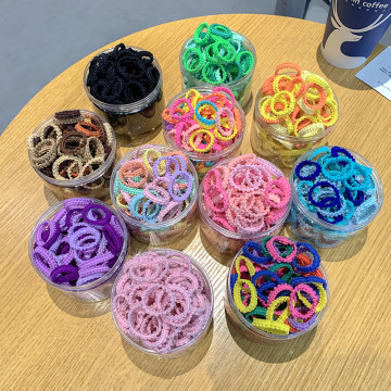 100pcs/κουτί πολύχρωμες λαστιχένιες ζώνες ελαστικών ελαστικών μαλλιών για μωρά