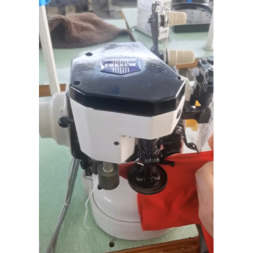 Machine de couture de liaison à entraînement direct