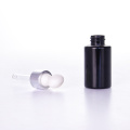 Black essential oil bottles with white rubber bulb