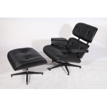 Fauteuil lounge et pouf Eames en contreplaqué noir