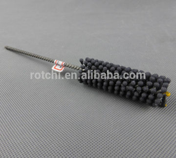 Flexible honing brush